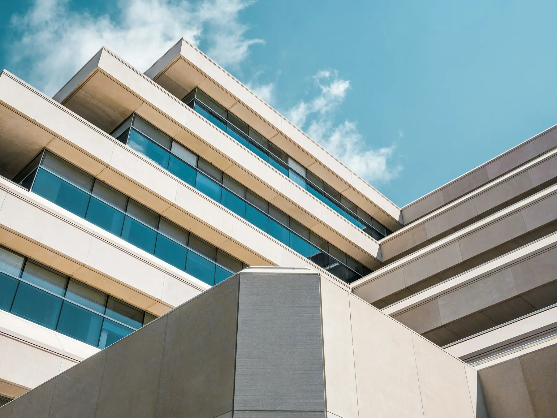 Stepped stone and glass facade of a commercial building