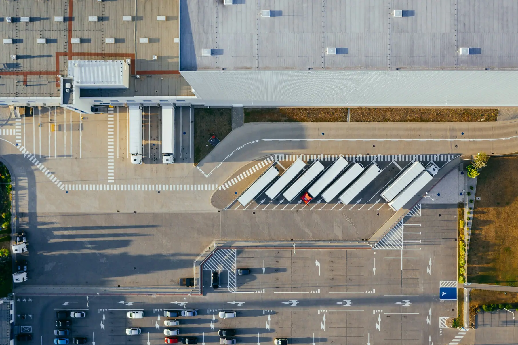 Aerial view of a logistics warehouse and loading yard